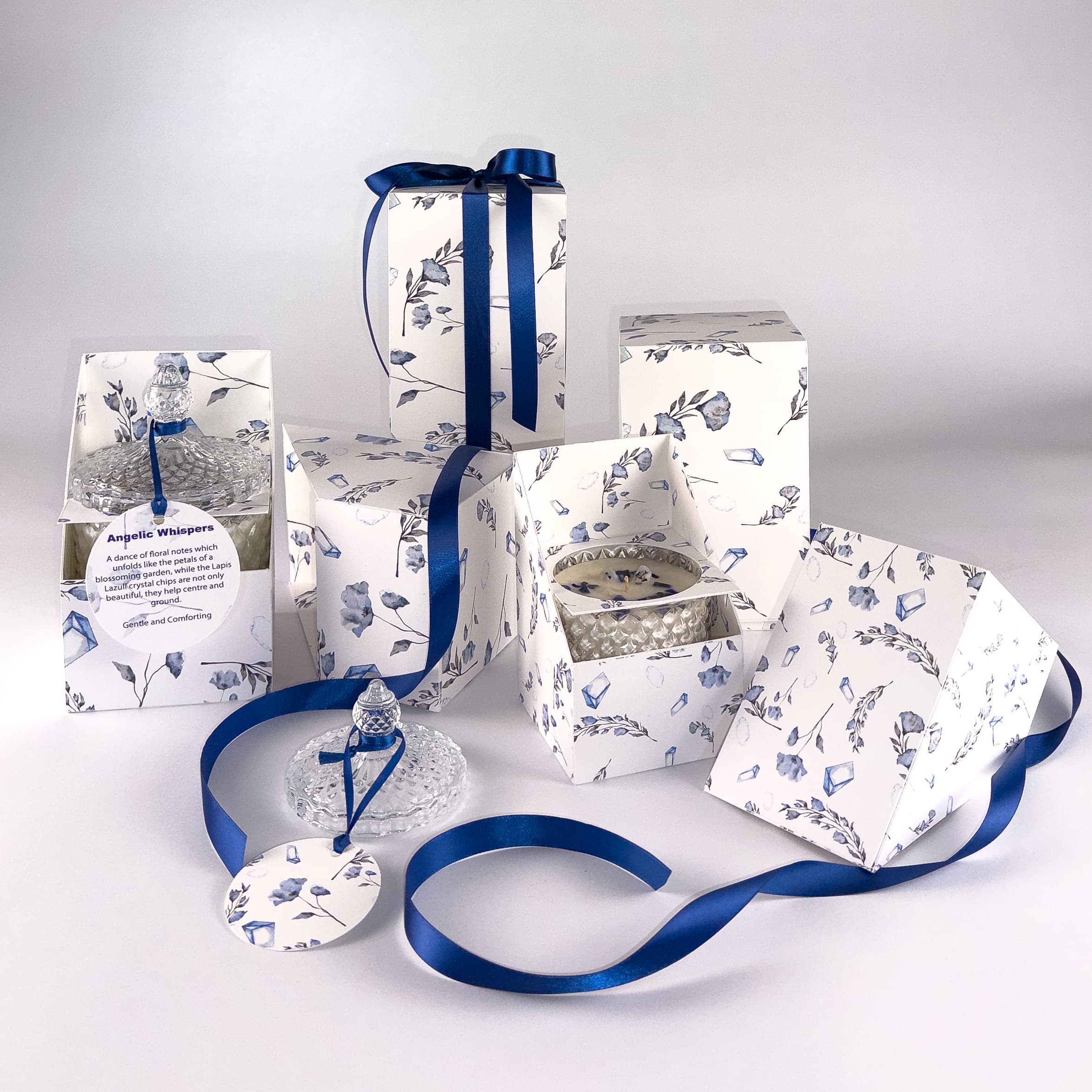 large and standard angelic whispers floral hand poured soy wax candles, beautiful handmade product boxes, tied with navy ribbon