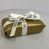2 pack tealight wrapped in gold tissue paper and tied with angelic thoughts ribbon