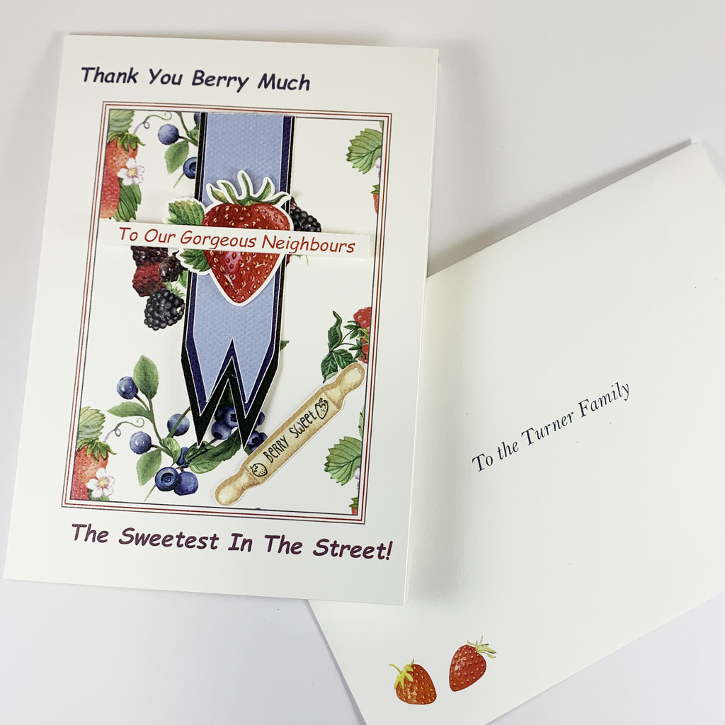 This image is of the card and the matching envelope. The card is shown as an example of how it can be used, in this case as a thank you card. At the top it has &quot;Thank You Berry Much.  In the first panel it has &quot;To Our Gorgeous Neighbours&quot; and at the base of the card &quot;The Sweetest In The Street&quot;. On the white envelope front are two nice strawberries in the bottom left hand corner.