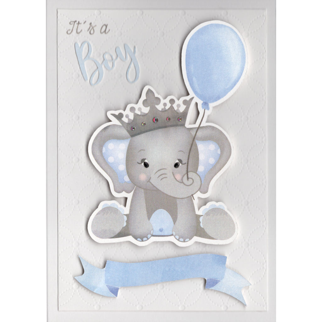 A pale grey card with a cute baby elephant image raised up from card. He has large ears lined with blue with white polka dots. Shiny black eyes and a pewter crown embellished with crystals sits on his head.  He is holding a blue balloon with his trunk. There is a banner  at the elephants feet where a name or message can be written.  The words &quot;It&