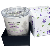 front on view of Lavender and Lime candle in white simplicity glass container with clear lid with personalised label sitting in black product box base with printed lid sitting beside