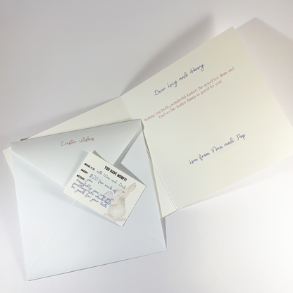 This image shows the back of the envelope, the gift tag and the open card.