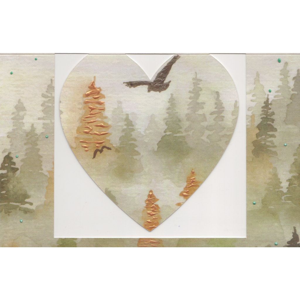 The front features a cut out  heart that swings freely in a frame. A misty watercolor pine forest scene in muted autumn tones with soaring birds. The main bird has been embellished with clear accents and the orange trees have been embellished with an auburn pearl colour. There are spots of page green dotted on the card for interest. These accents have been selectively hand applied.