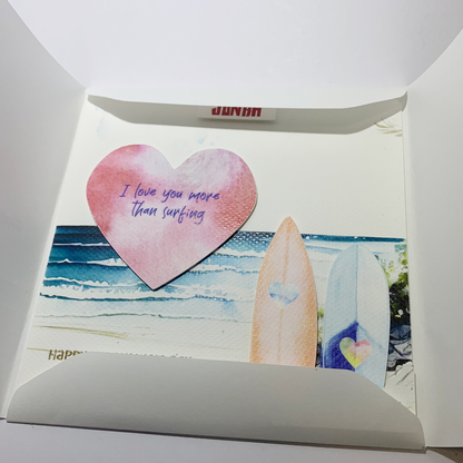 photo of of customised Valentines Personalized Romantic Ocean Greeting Card with Surfboards sitting in folder