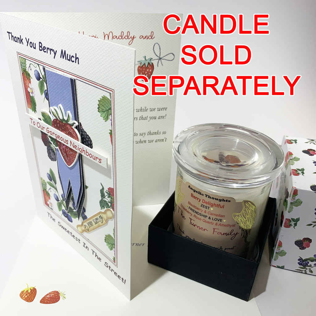 This image shows the card upright, slightly open, allowing you to see the way the elements are raised out from the card surface. There is also an image of the matching &quot;Berry Delightful&quot; candle in a black box base with the partial view of the side of the box top, which is white with berries printed randomly on it. The words &quot;Candle Sold Separately&quot; are printed in red.