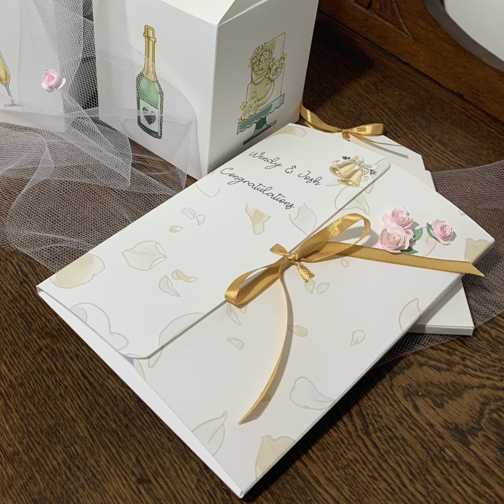 matching wedding card in folder with box pair of wedding candles