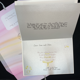 open personalised wedding card, their names, and yours with message