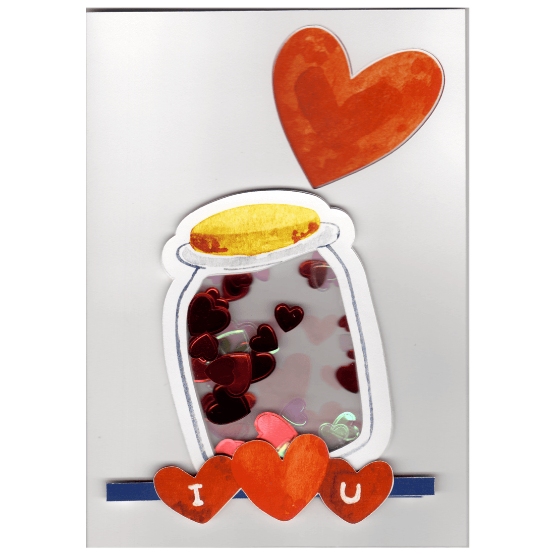 Card featuring a jar of hearts and and heart cutout in the top right hand corner on the outstside. The jar is created as a shaker window containing irridescent pearl and red hearts of various sizes.