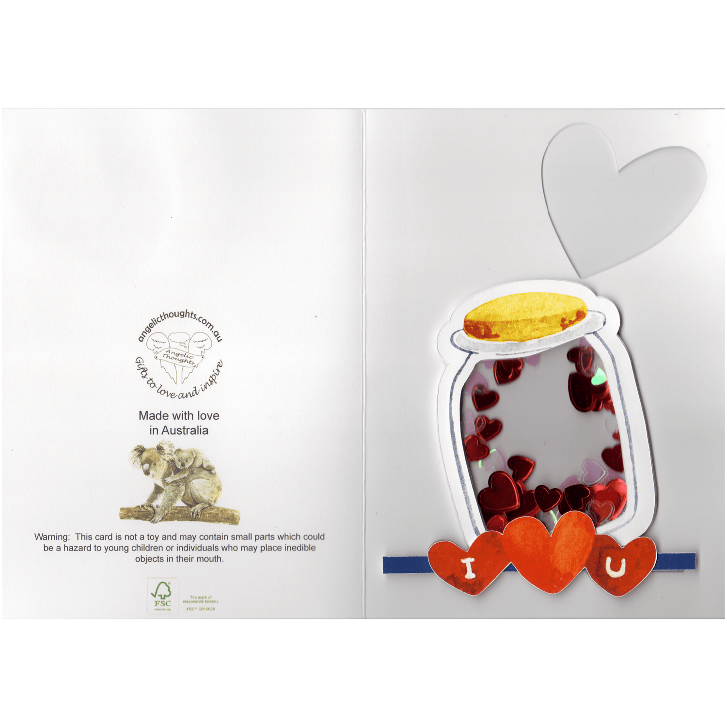 Card featuring a jar of hearts on the front and and heart cutout in the top right hand corner on the outstside. The jar is created as a raised shaker window containing irridescent pearl and red hearts of various sizes. On the mid to bottom left back of greeting card featuring Angelic Thoughts logo, web address, mother and infant koala with the words made with love in Australia and a choking hazard warning. FSC logo representing Responsible Forestry Certification.