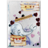 Handmade card featuring a raised cutout whale on a wooden box with heart banner and the customisable name of the recipient. It is fully enclosed in a shaker pocket with irridescent and red hearts of varying sizes and blue glitter.