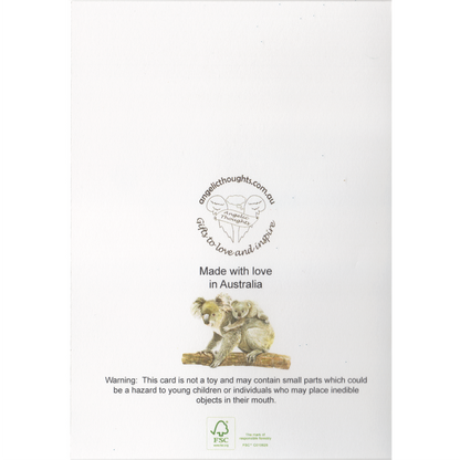 Back of greeting card featuring Angelic Thoughts logo, web address, mother and infant koala with the words made with love in Australia and a choking hazard warning. FSC logo representing Responsible Forestry Certification.
